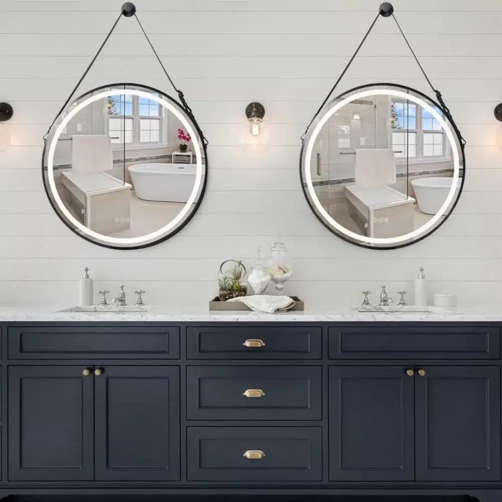 Comparison of metal, wood, and frameless LED mirror frames for home decor.
